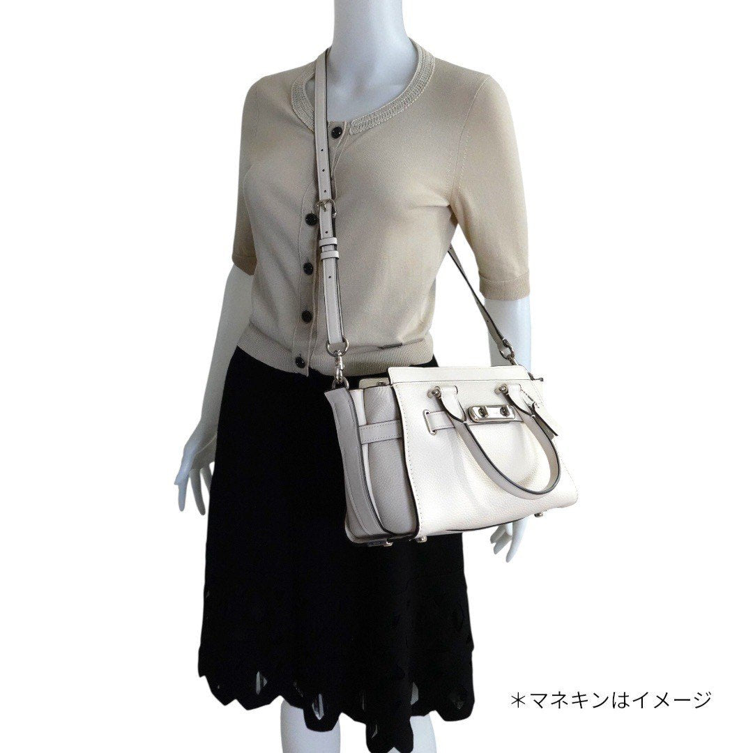 コーチ ショルダーバッグ 2WAYハンドバッグ シグネチャー ターンロック 白 ホワイト レディース