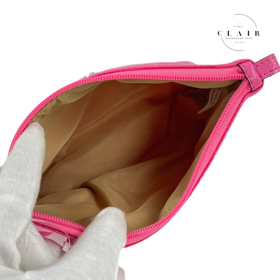 コーチ シグネクチャー柄 ナイロンポーチ 化粧ポーチ 小物入れ ピンク F77382